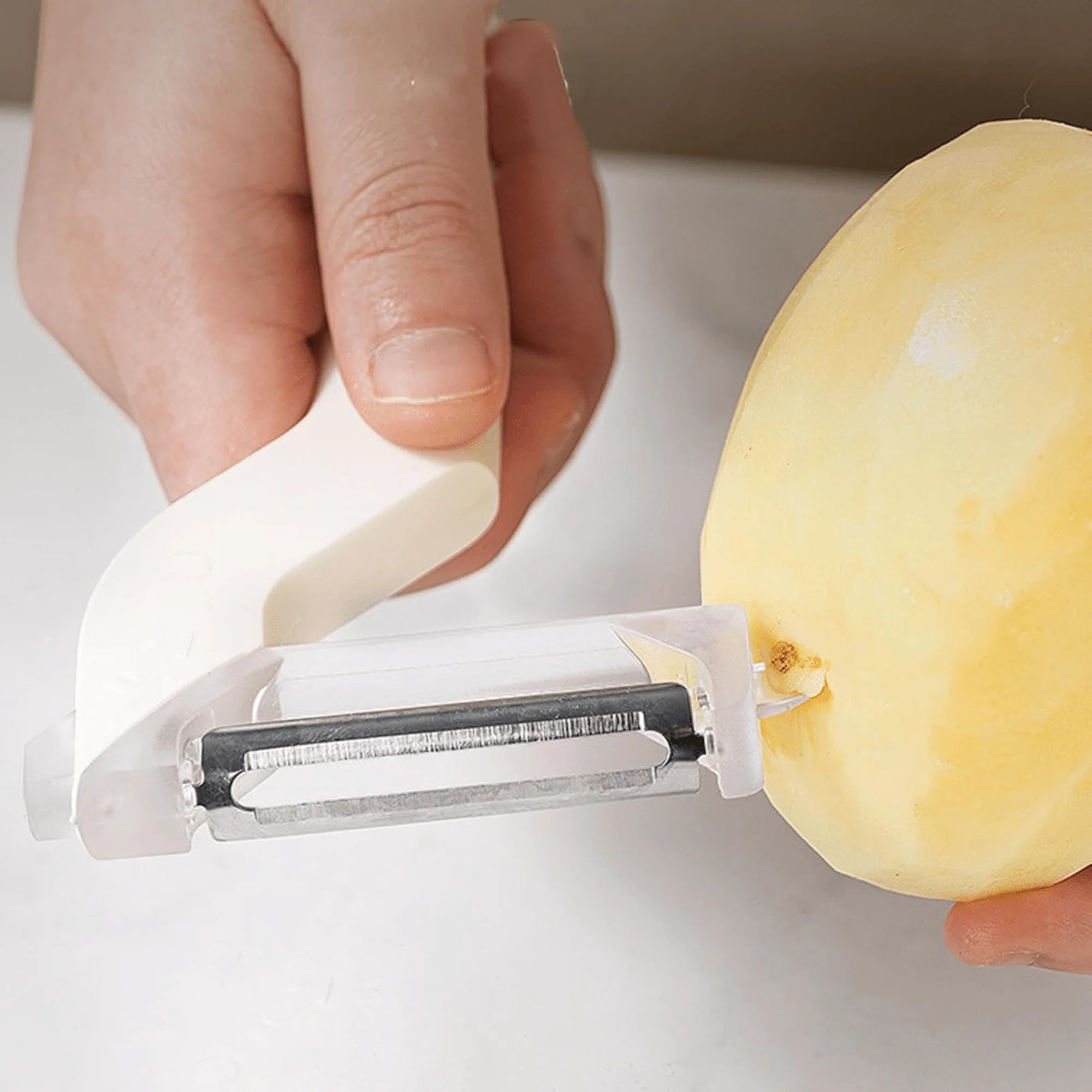 Multi-Functional Stainless Steel Fruit and Vegetable Peeler with Ergonomic Handle - Image 2